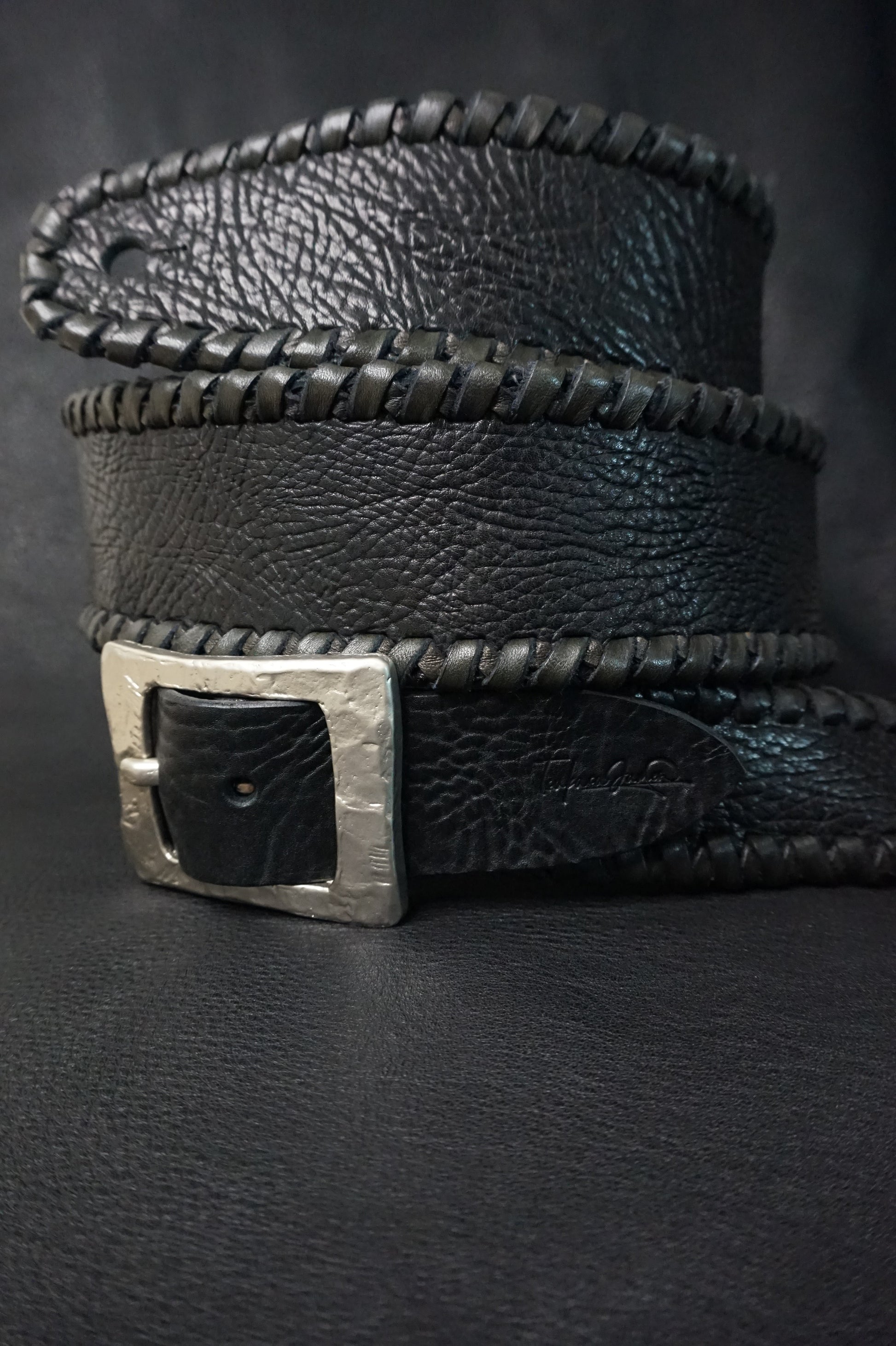 Buckle detail on ASHIGARU handmade leather guitar strap, nickel hardware