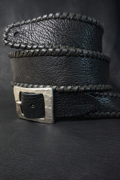 Buckle detail on ASHIGARU handmade leather guitar strap, nickel hardware