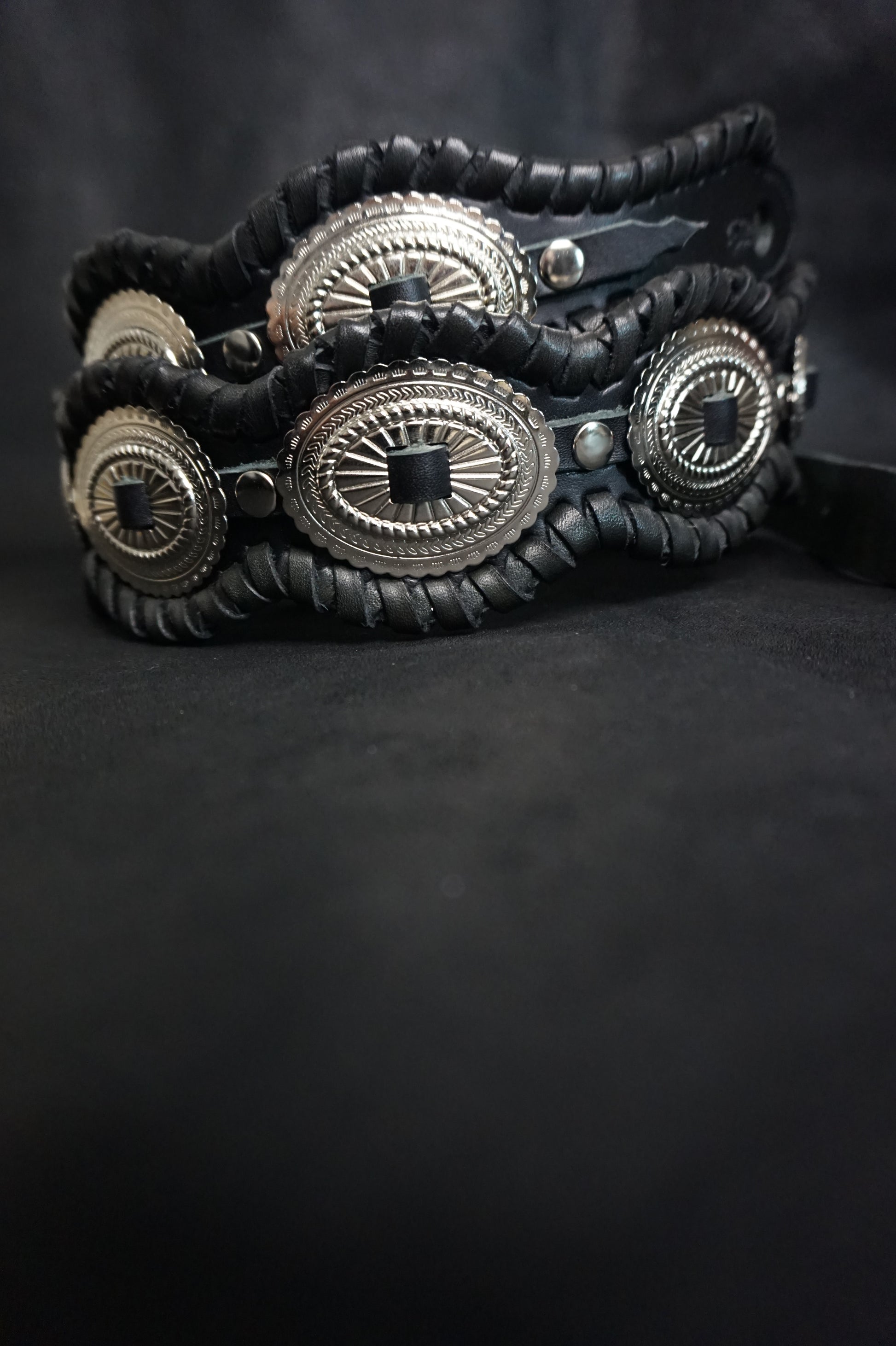 Concho row on BLACK RAIDEN handmade black leather guitar strap from Japan