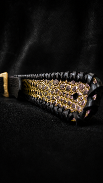 Close-up of gold croc-embossed leather texture on EN-RYU TsukasaJames guitar strap