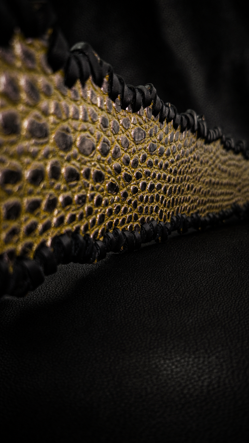 Edge detail of EN-RYU croc-embossed cowhide leather guitar strap from Japan