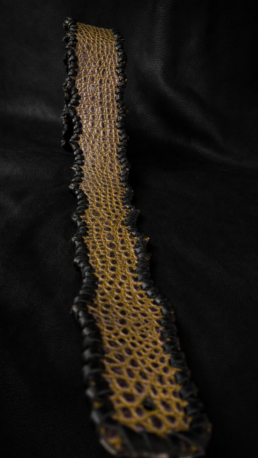 Close-up of uneven dragon edge on EN-RYU leather guitar strap from Japan
