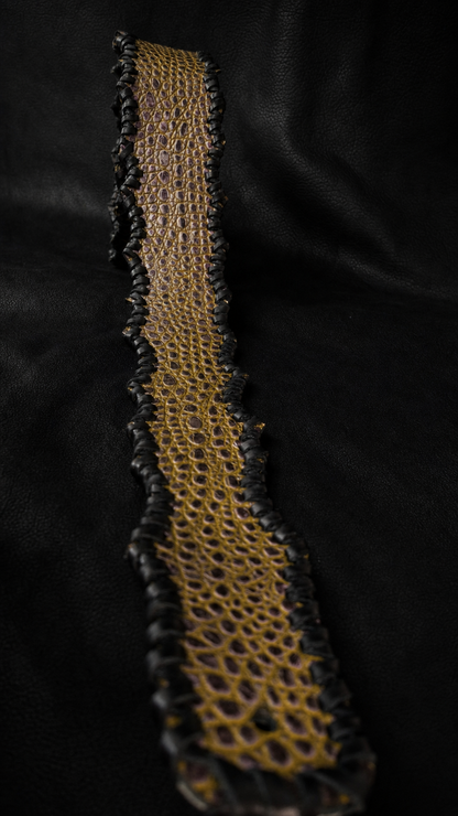 Close-up of uneven dragon edge on EN-RYU leather guitar strap from Japan