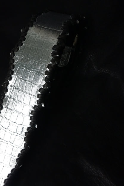 Buckle detail on HAKU-RYU handmade leather guitar strap, silver hardware