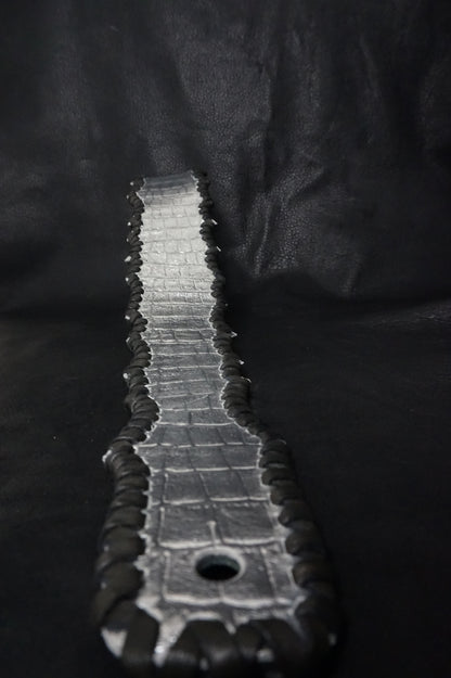 Side view of HAKU-RYU silver leather guitar strap showing width and texture