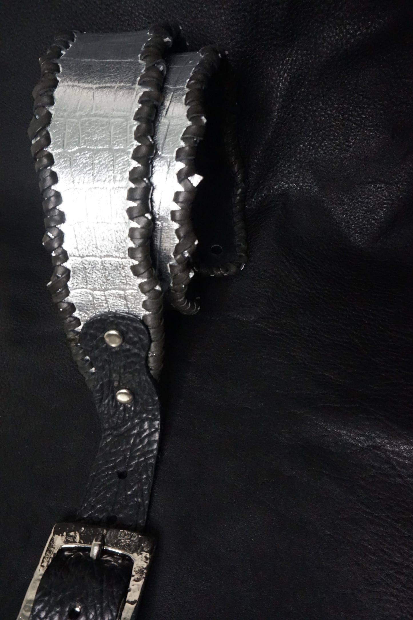 HAKU-RYU handmade leather guitar strap adjustment holes detail