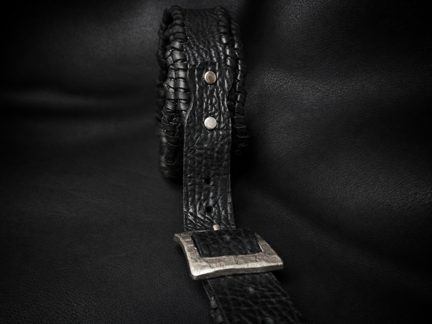 Buckle detail on HINAWA handmade leather guitar strap, nickel hardware