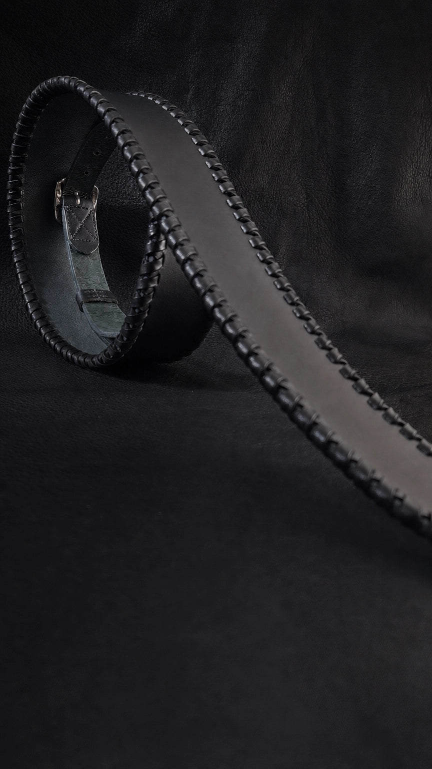 Side profile of NINJA WIDE leather guitar strap showing width and texture