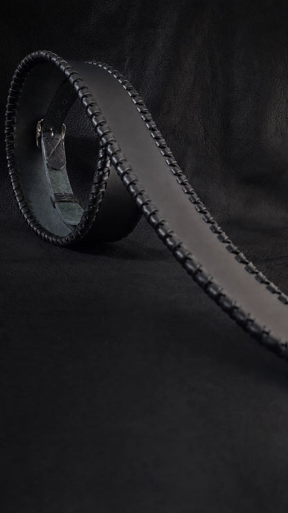 Side profile of NINJA WIDE leather guitar strap showing width and texture
