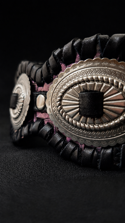 Close-up of silver concho detail on RAIDEN leather guitar strap